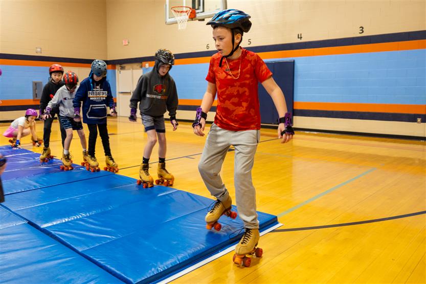 Students skate in PE